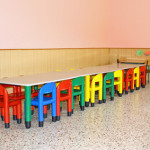 Chairs and small tables in a dining hall for a kindergarten